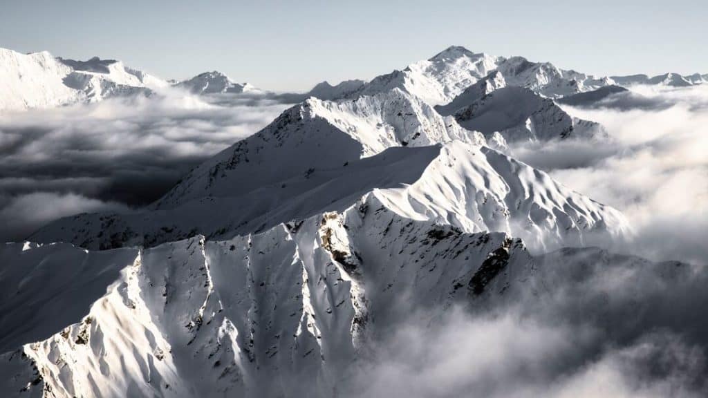 A view of the Southern Alps surrounding Wanaka, covered in snow